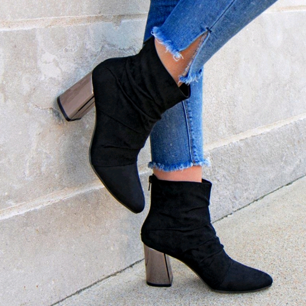Black velvet boots with chrome heel